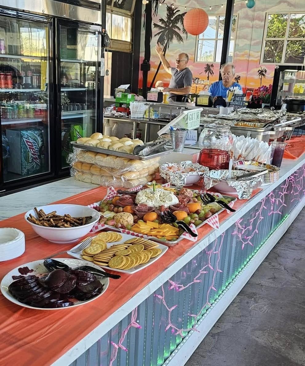 A buffet spread along V9's counter with the crew serving