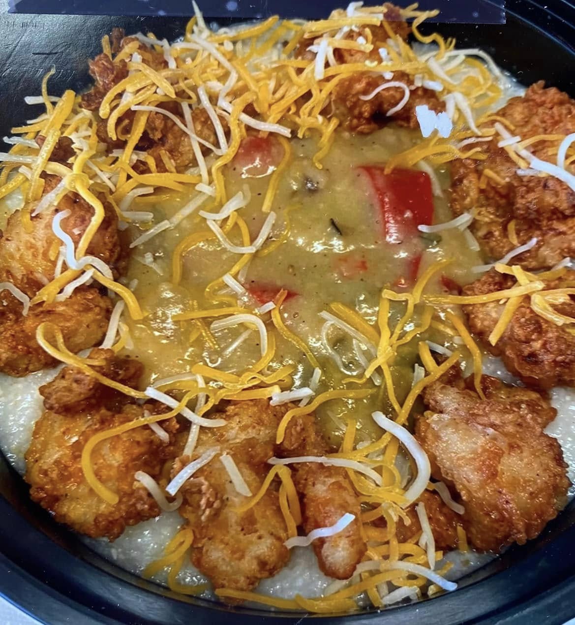 A past weekend special: fried chicken over cheesy grits