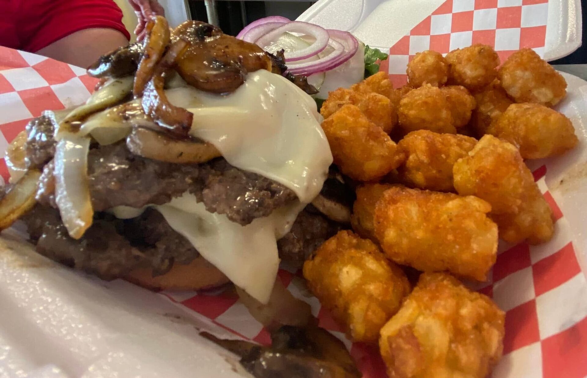 Mushroom Swiss burger with tots
