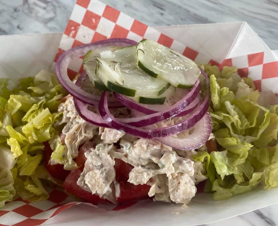 Creamy Chicken Salad served in a stuffed tomato